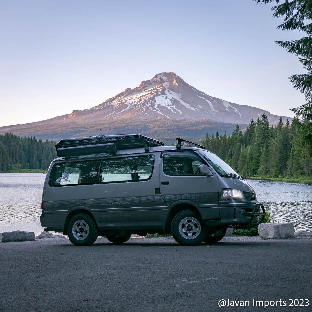 Toyota HiAce 4WD van on a mountain trail